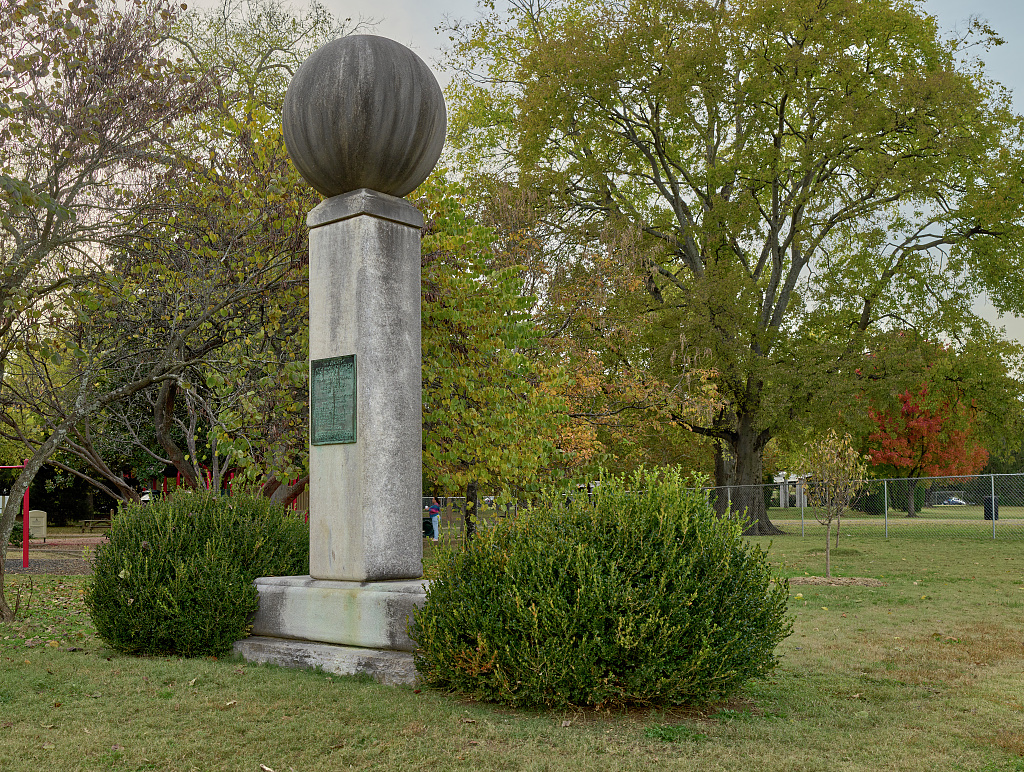 A stone monument in Nashville, Tennessee's Centennial Park marking the site of the Woman's Building.